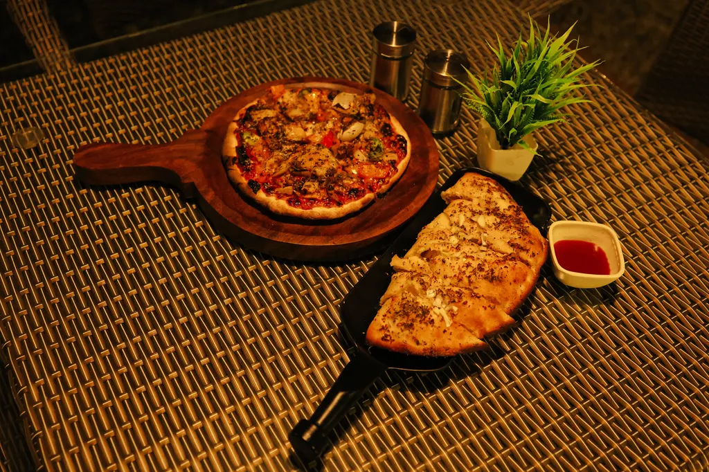 Fresh Pizza and Garlic Bread